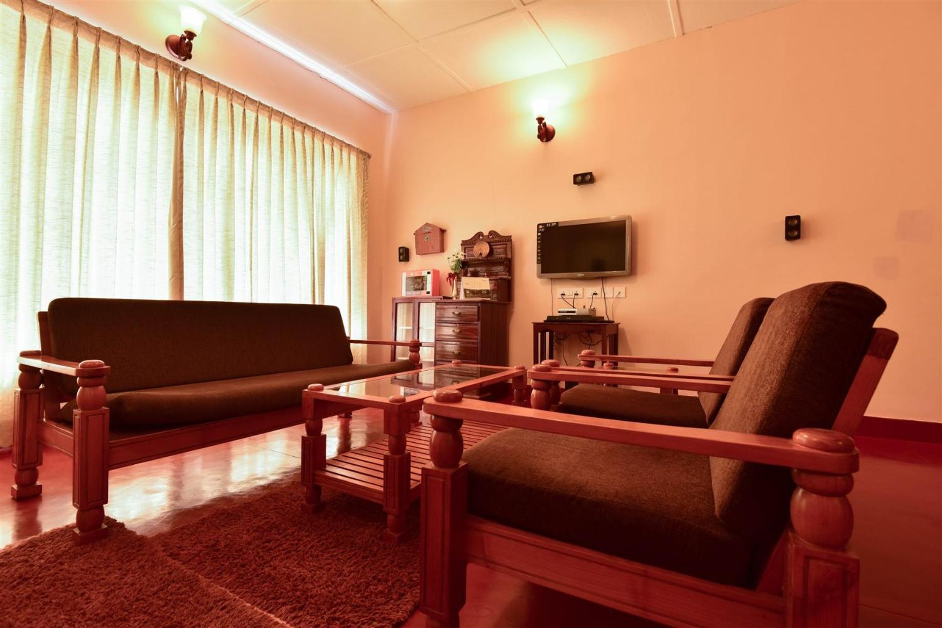 Manalar Hotel Gudalur  Bilik gambar